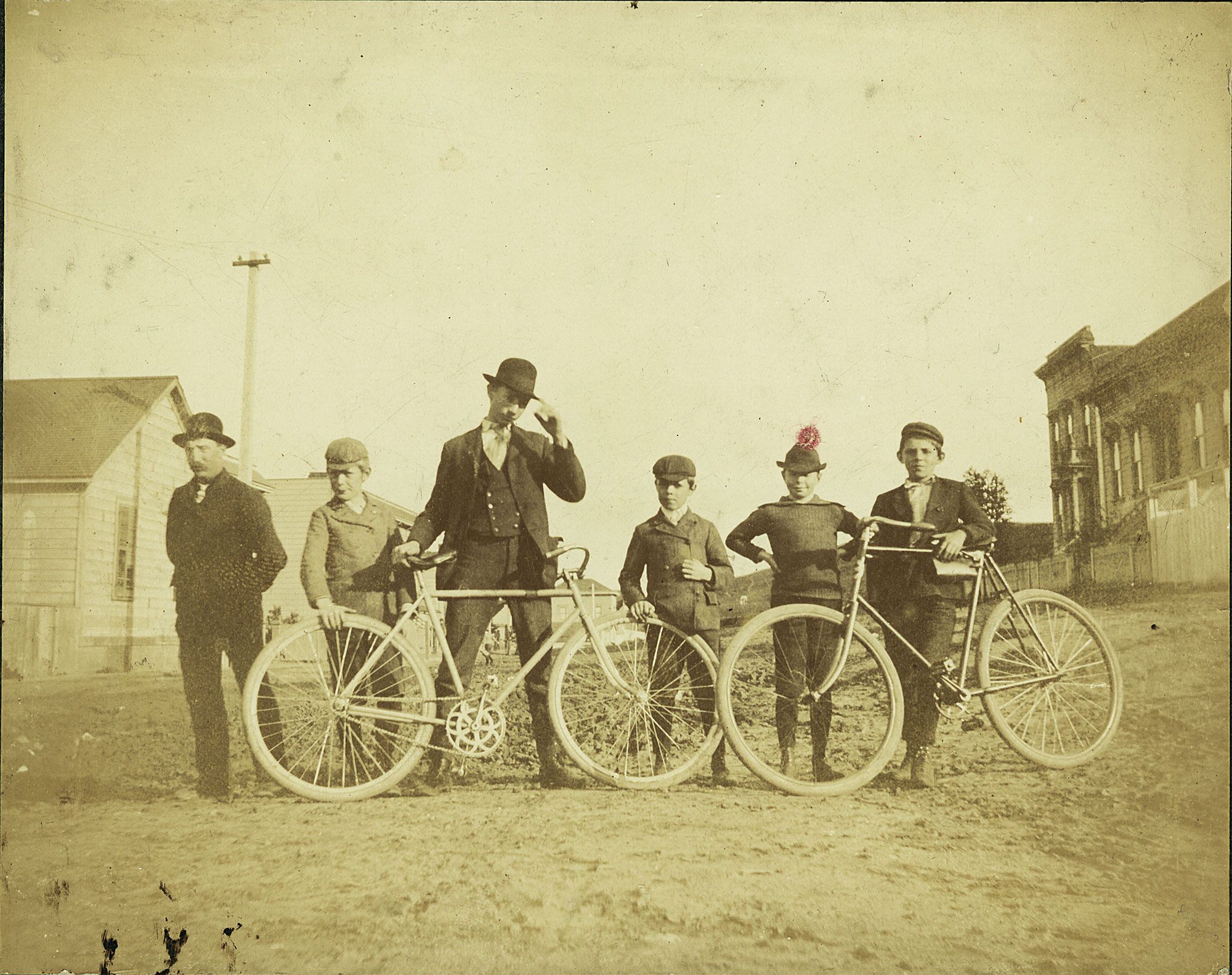 Boys with bicycles in early 1900s.