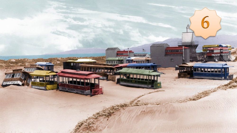 Old horsecars on sand
