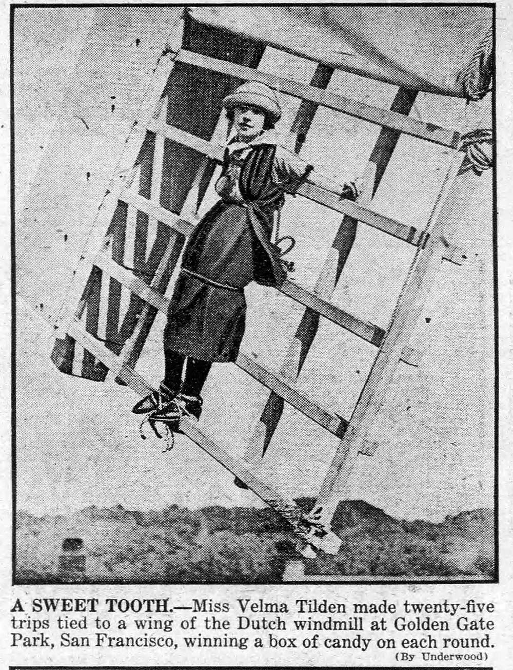 Woman tied to windmill