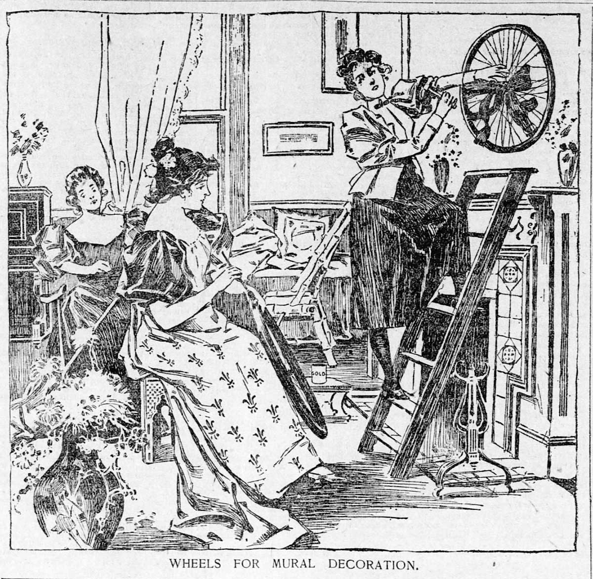 Women hanging bike wheels on walls