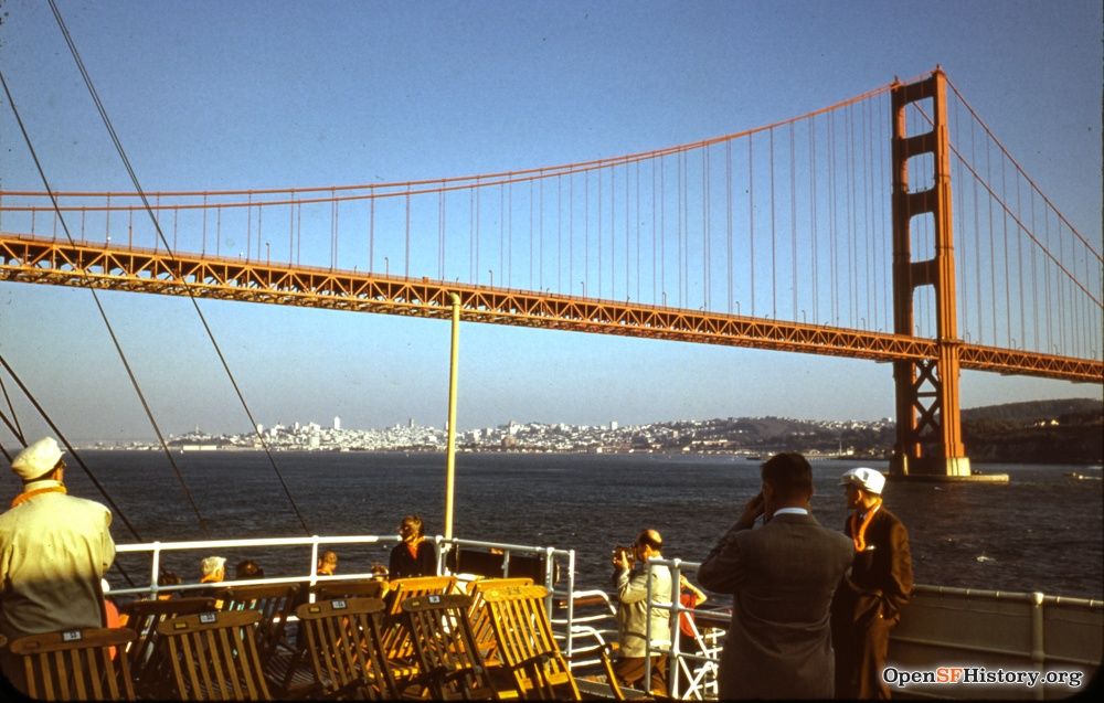Passengers on a boat near Golden Gate Bridge.